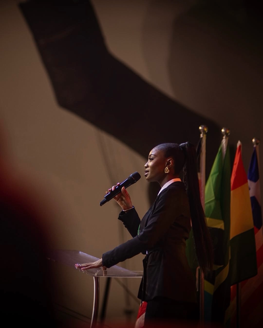 Founder of MAJ Media Digital speaking on stage at a conference
